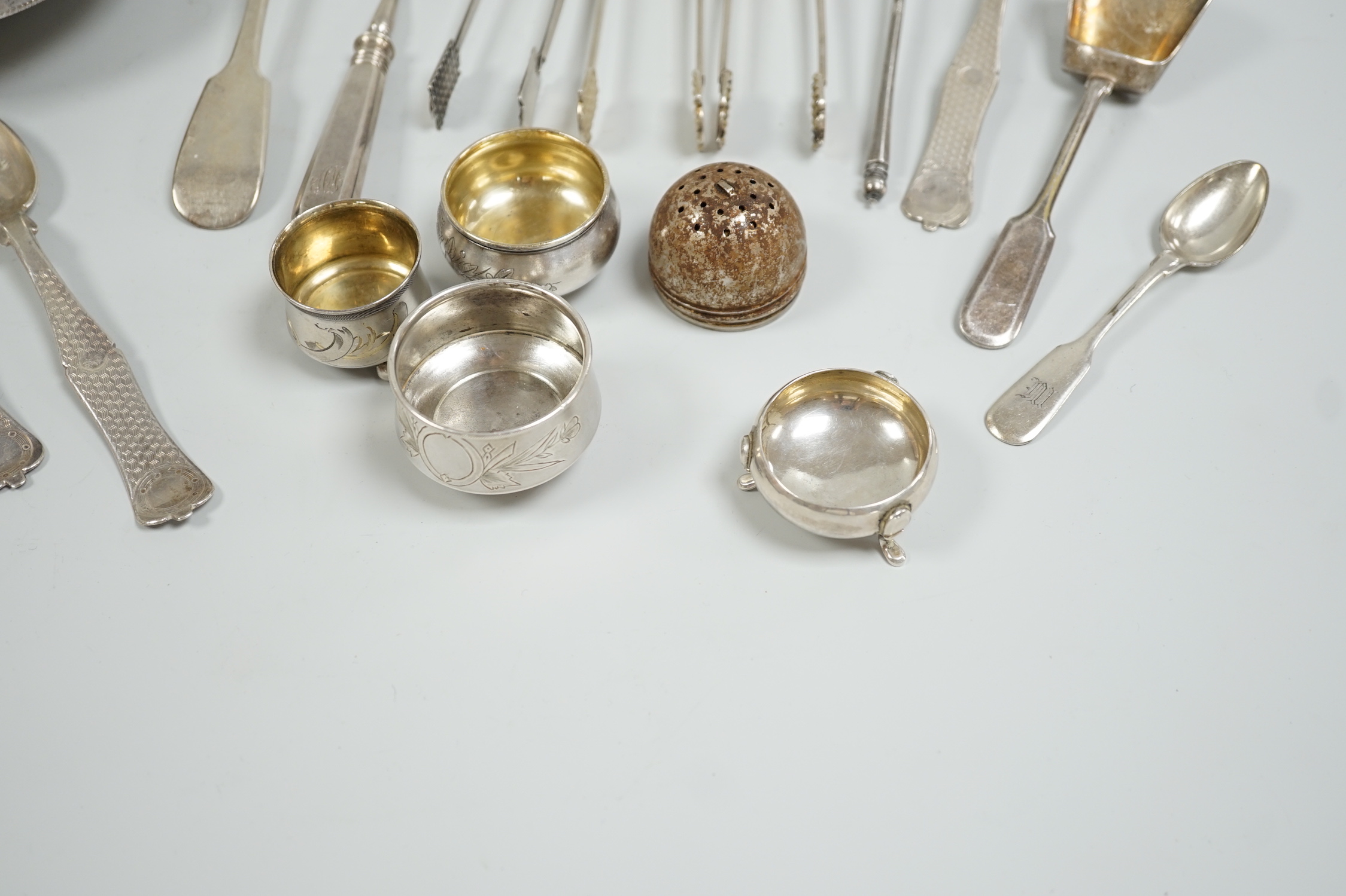 Miscellaneous white metal and plated cutlery including Russian and four small white metal salts including Russian and a plated dish.